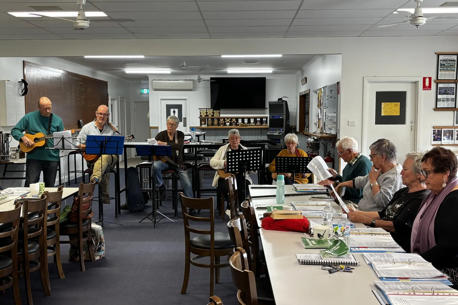 <p>SENIORS WEEK: Uke\\'s for Fun group and Singing for Pleasure rehearsing.</p>\\n