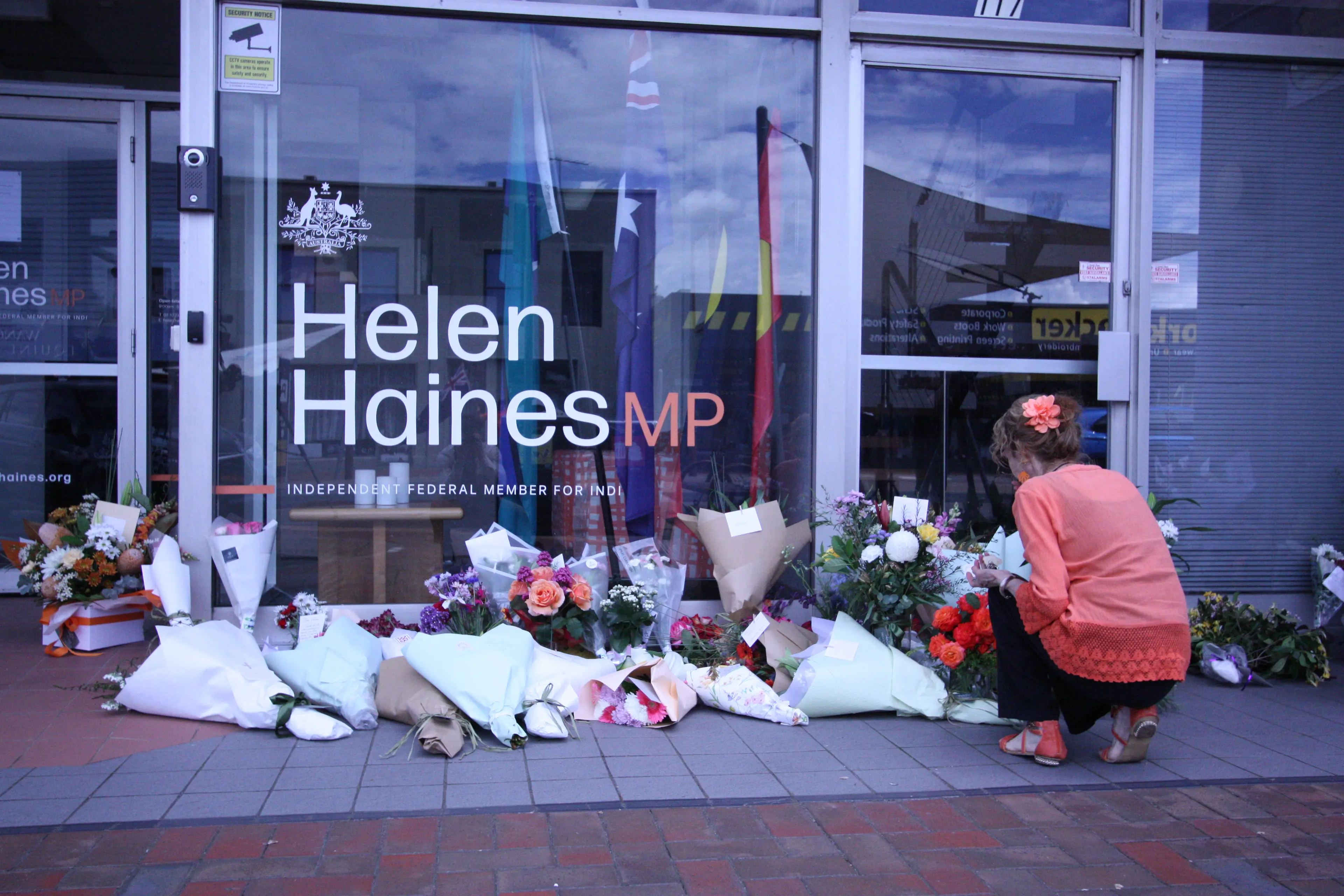<p>COMMUNITY SHOCK: The Wangaratta and wider North East community continue to come to terms with Monday afternoon\\'s incident, as community members pay tribute outside of Helen Haines\\' office, where the crash occurred. PHOTO: Bailey Zimmermann</p>\\n